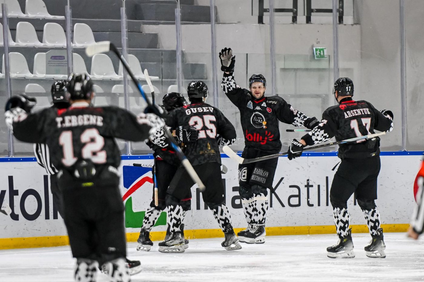 Buzadam players celebrating a goal